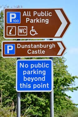 Parking signs on the approach into Craster